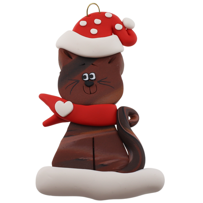 Ornament of brown cat in red and white polka dot Christmas hat and scarf.