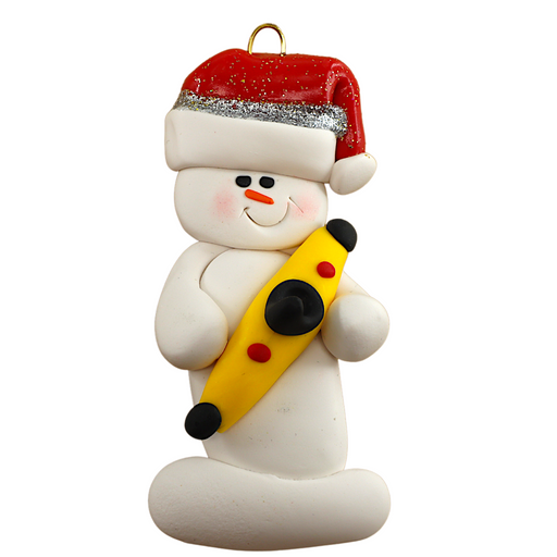 Ornament of white snowman in red hat holding a yellow kayak.