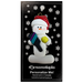 Ornament of white snowman in red hat holding a pickleball paddle and yellow pickleball, on display backing card.