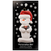 Ornament of white snowman in red hat holding several small rocks, on display backing card.