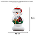 Ornament of white snowman in red hat holding a sign with a house saying “sold”, graphed to show size (4.5x9cm).