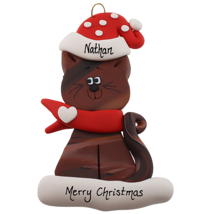 Ornament of brown cat in red and white polka dot Christmas hat and scarf, personalized with name.