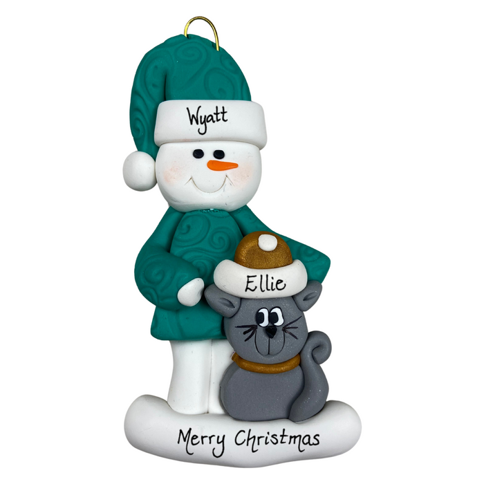 Ornament of snowman in a green shirt and hat with grey cat in Christmas hat, personalized with names.